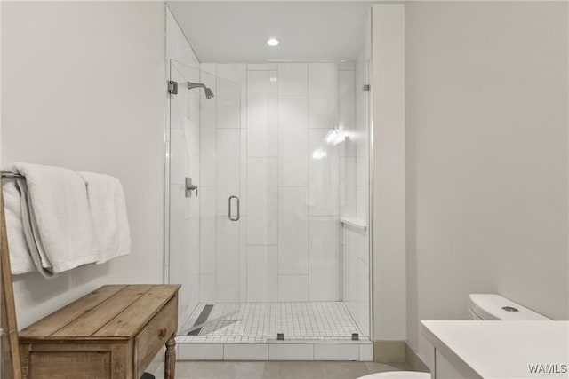 1150 8th St Unit 314, Tuscaloosa, AL 35401 - bathroom featuring a shower stall, vanity, and recessed lighting