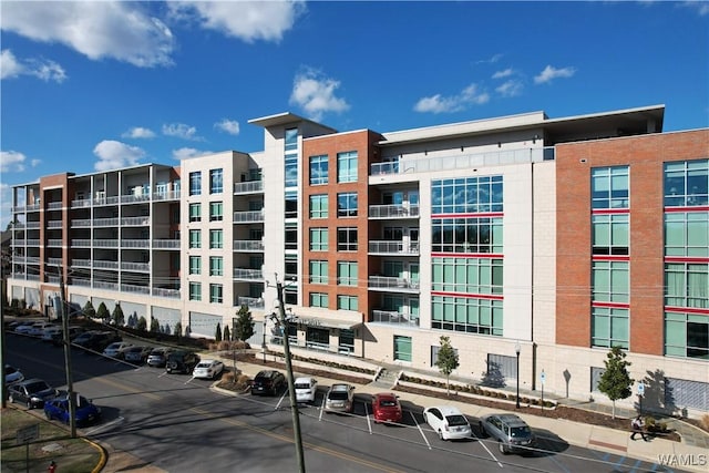 1150 8th St Unit 314, Tuscaloosa, AL 35401 - view of apartment building / complex with uncovered parking