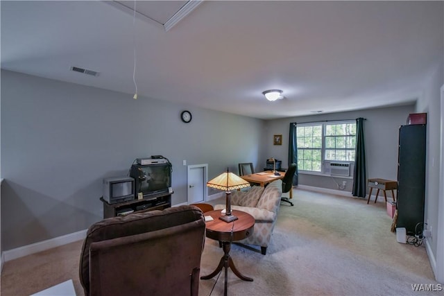 4401 Nicholas Ave, Northport, AL 35473 - living area featuring light carpet, baseboards, and an office area