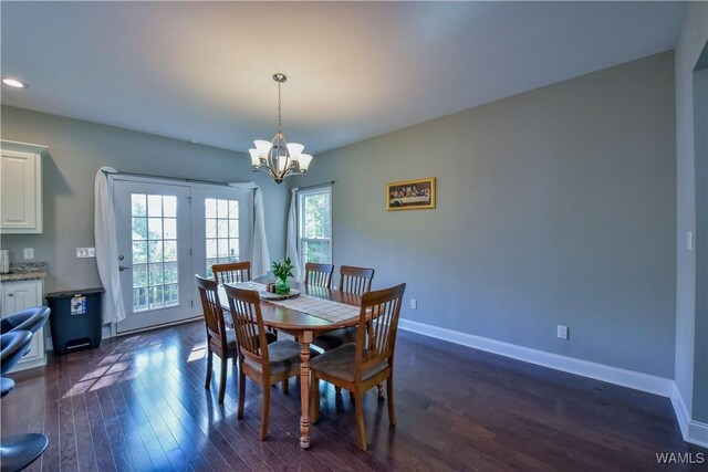 4401 Nicholas Ave, Northport, AL 35473 - dining room featuring dark wood finished floors, a chandelier, baseboards, and recessed lighting