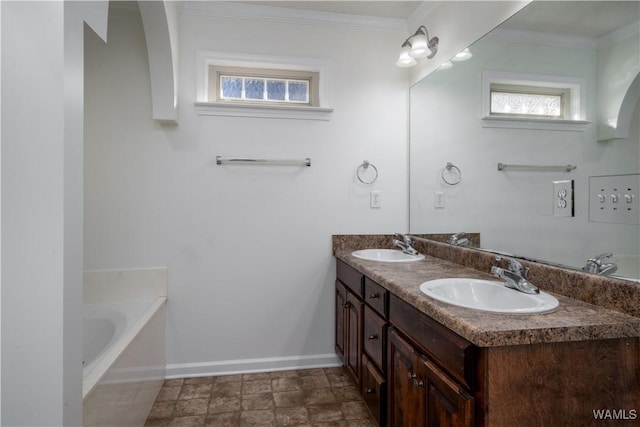 bathroom featuring crown molding, vanity, and a bath