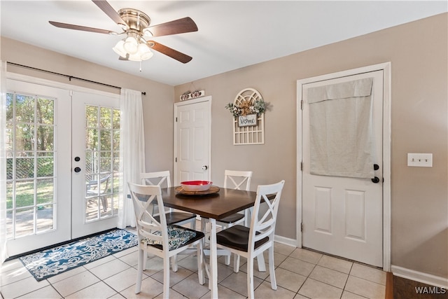 tiled dining area with french doors and ceiling fan