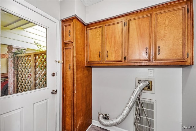 1924 Still Oaks Dr, Montgomery, AL 36117 - laundry room featuring cabinet space, washer hookup, and wood finished floors