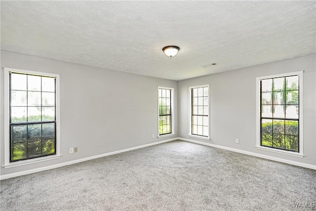 1924 Still Oaks Dr, Montgomery, AL 36117 - carpeted spare room with a textured ceiling