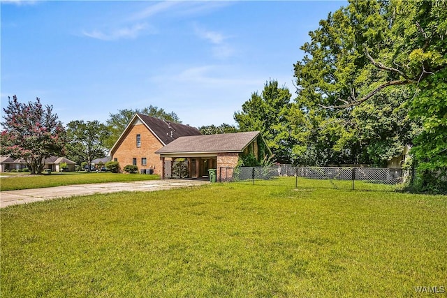 1924 Still Oaks Dr, Montgomery, AL 36117 - view of front of property with driveway, a carport, and brick siding