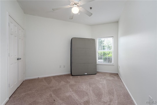 303 Helen Keller Blvd Unit A111, Tuscaloosa, AL 35404 - unfurnished bedroom with carpet flooring and ceiling fan