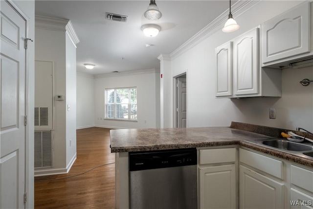 303 Helen Keller Blvd Unit A111, Tuscaloosa, AL 35404 - kitchen with dishwasher, a peninsula, ornamental molding, dark wood finished floors, and dark countertops