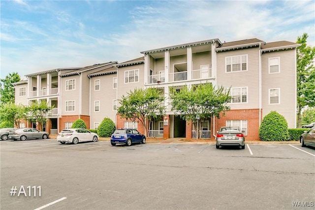 303 Helen Keller Blvd Unit A111, Tuscaloosa, AL 35404 - view of property featuring uncovered parking