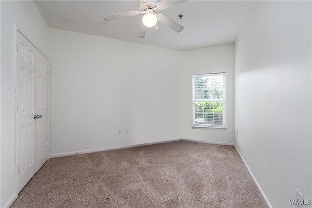 303 Helen Keller Blvd Unit A111, Tuscaloosa, AL 35404 - unfurnished bedroom featuring carpet floors and a ceiling fan