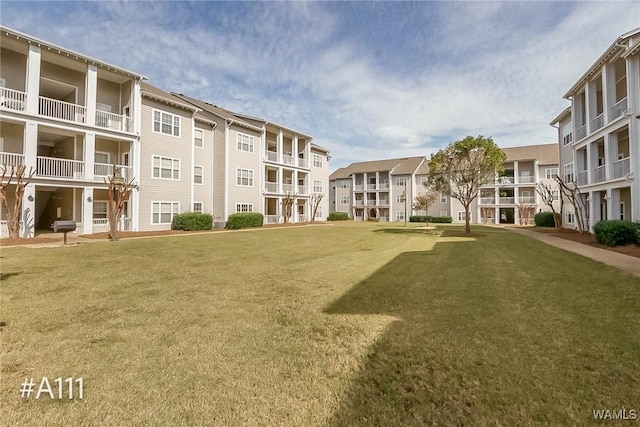 303 Helen Keller Blvd Unit A111, Tuscaloosa, AL 35404 - surrounding community with a lawn and a residential view