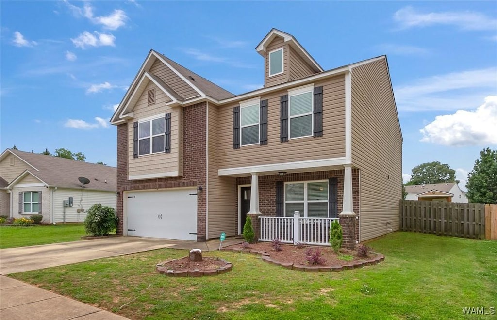 2246 Summer Haven Ln, Tuscaloosa, AL 35405 - craftsman-style home featuring covered porch, a garage, concrete driveway, and brick siding