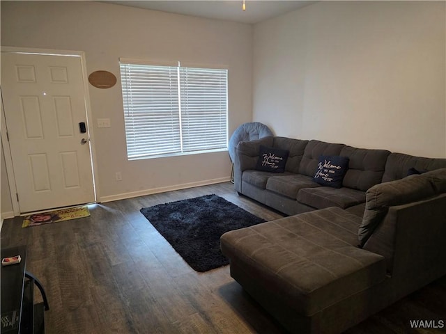 12376 Choctaw Cir, Moundville, AL 35474 - living room featuring dark wood-type flooring and baseboards