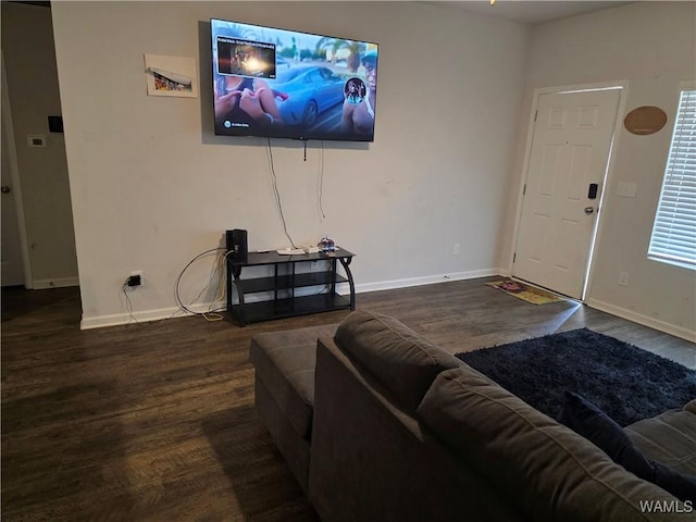 12376 Choctaw Cir, Moundville, AL 35474 - living area featuring dark wood finished floors and baseboards