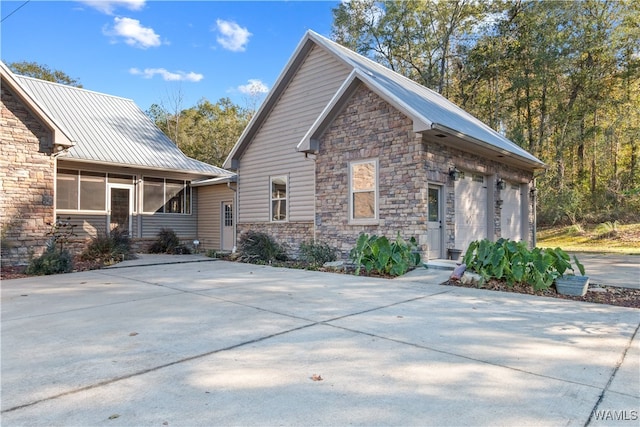 view of property exterior featuring a garage