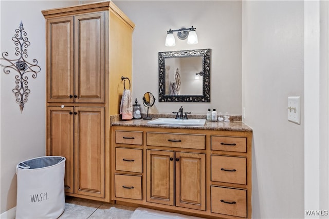 bathroom featuring tile patterned floors and vanity