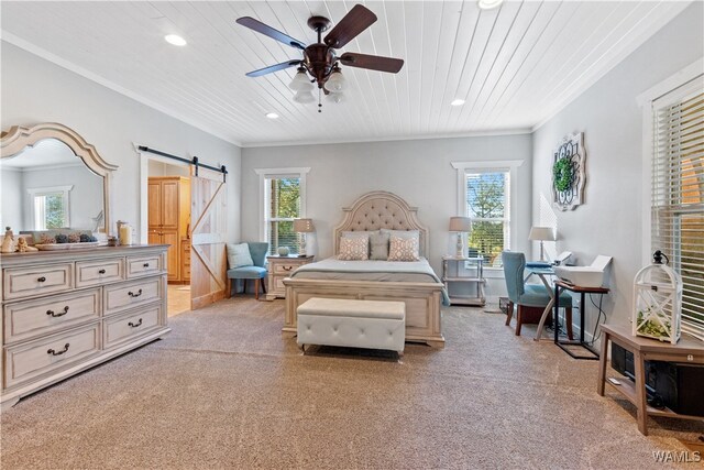 carpeted bedroom featuring ceiling fan, a barn door, and wood ceiling