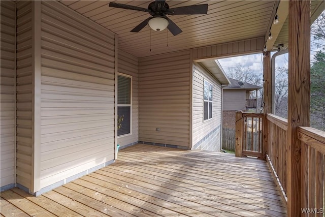 wooden deck with ceiling fan