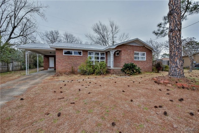 view of front of property with a carport