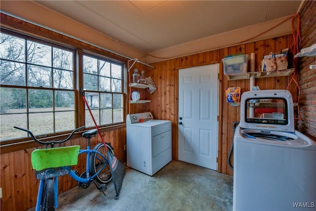 laundry room featuring wooden walls