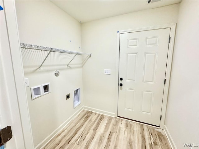 laundry room featuring electric dryer hookup, light wood-style flooring, baseboards, hookup for a washing machine, and laundry area