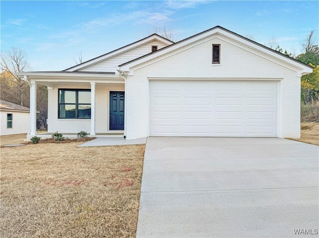 view of front of house with a porch and a garage