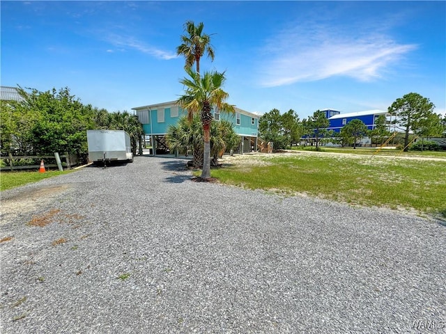 beach home with gravel driveway