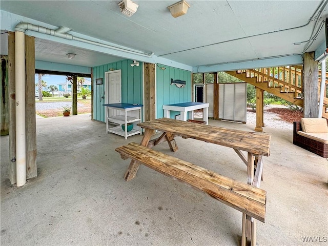 view of patio featuring stairway