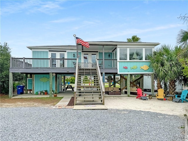 exterior space with a carport and stairway