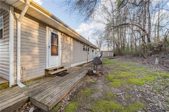 view of yard with a wooden deck