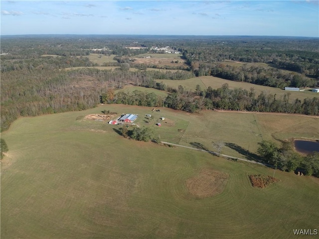 birds eye view of property featuring a rural view