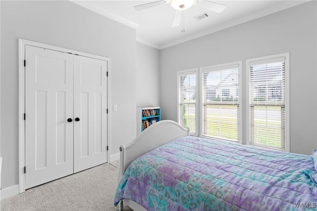 13880 Glenview Dr, Northport, AL 35475 - bedroom featuring carpet flooring, ornamental molding, ceiling fan, a closet, and baseboards