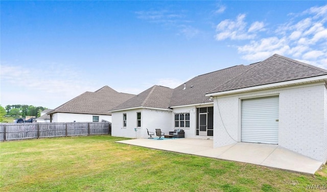 13880 Glenview Dr, Northport, AL 35475 - rear view of house with a patio and a shingled roof