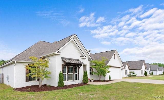 13880 Glenview Dr, Northport, AL 35475 - view of side of property with a garage, driveway, and a yard
