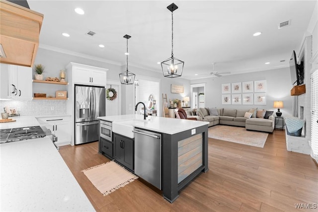 13880 Glenview Dr, Northport, AL 35475 - kitchen with appliances with stainless steel finishes, a sink, light countertops, a ceiling fan, and recessed lighting