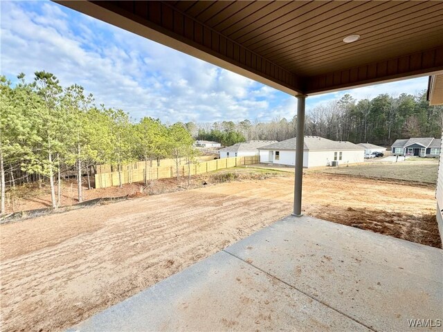 view of yard with a patio and a rural view