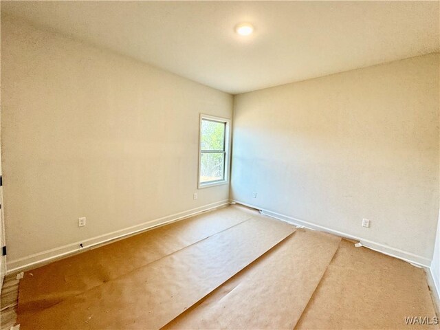 bathroom with hardwood / wood-style floors and vanity