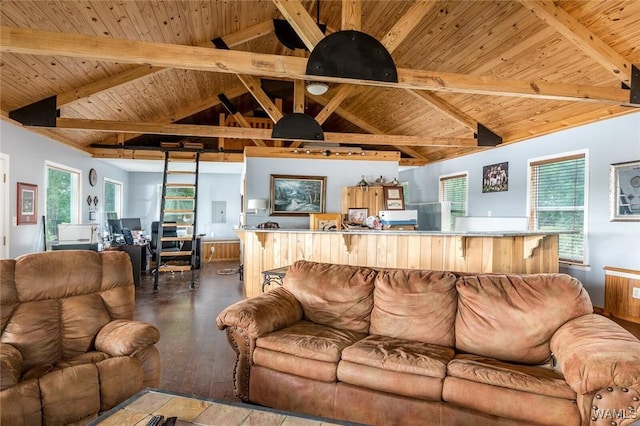 living room featuring plenty of natural light, lofted ceiling with beams, and wooden ceiling