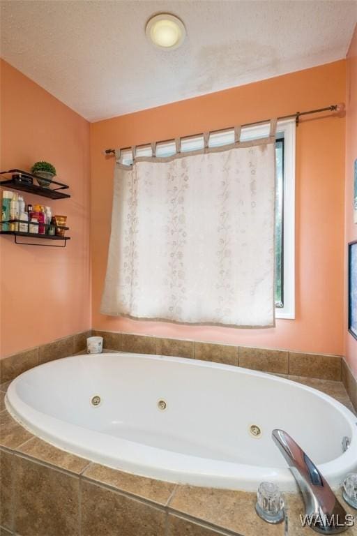 bathroom featuring tiled tub