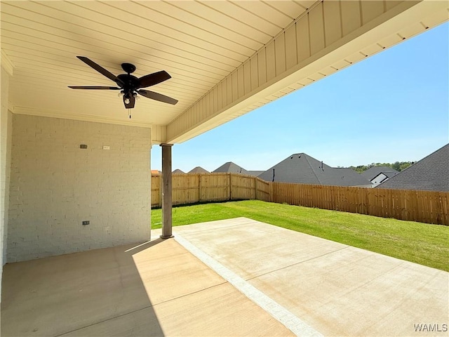 view of patio featuring a fenced backyard and ceiling fan