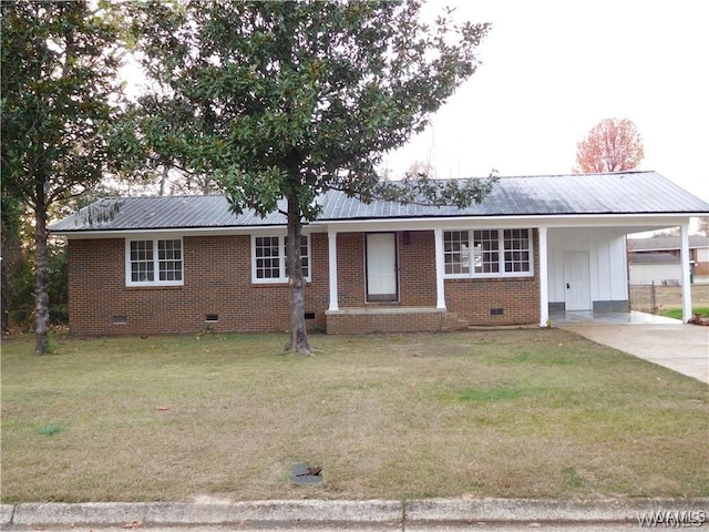 single story home with a front yard and a carport