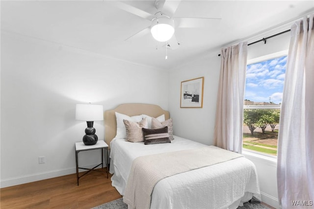 1228 8th St Unit 412, Tuscaloosa, AL 35401 - bedroom featuring wood finished floors and ceiling fan
