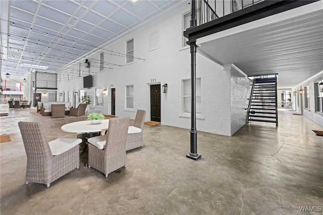 1228 8th St Unit 412, Tuscaloosa, AL 35401 - view of patio featuring outdoor dining space and an outdoor hangout area