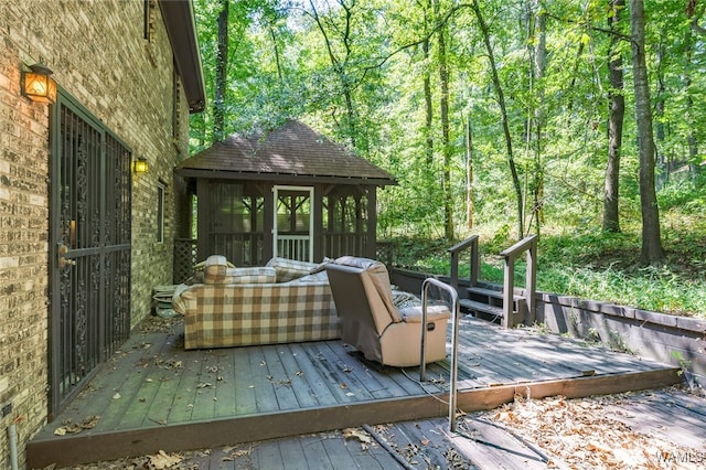 deck with a sunroom