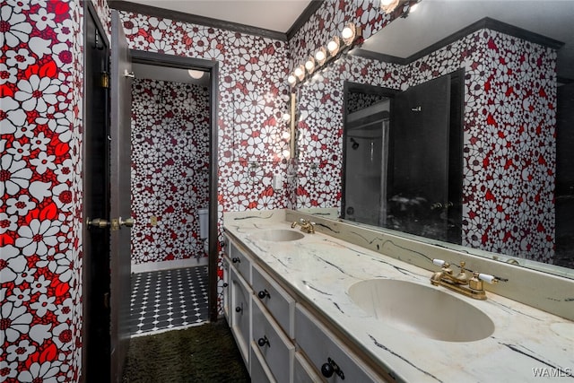 bathroom with vanity and ornamental molding