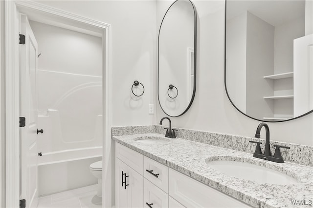 full bathroom featuring tile patterned flooring, vanity,  shower combination, and toilet