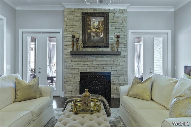 6020 Carleton Park Cir, Tuscaloosa, AL 35406 - living area with french doors, wood finished floors, crown molding, and a stone fireplace