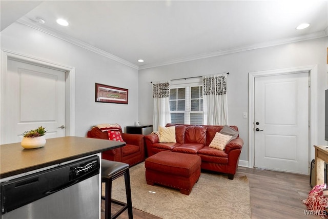 living room featuring ornamental molding and wood-type flooring