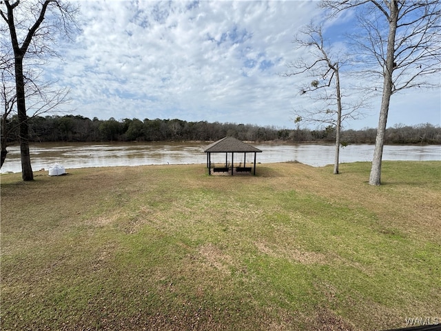 exterior space featuring a water view and a gazebo