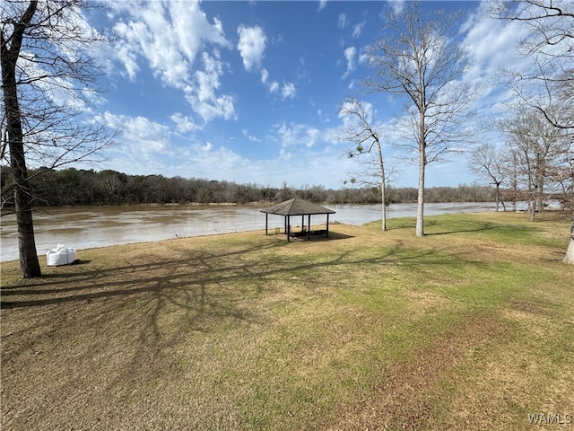 view of yard with a water view and a gazebo