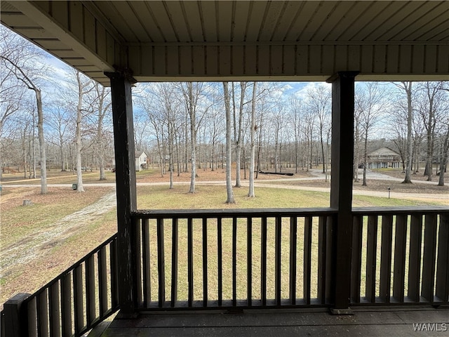 deck featuring a lawn